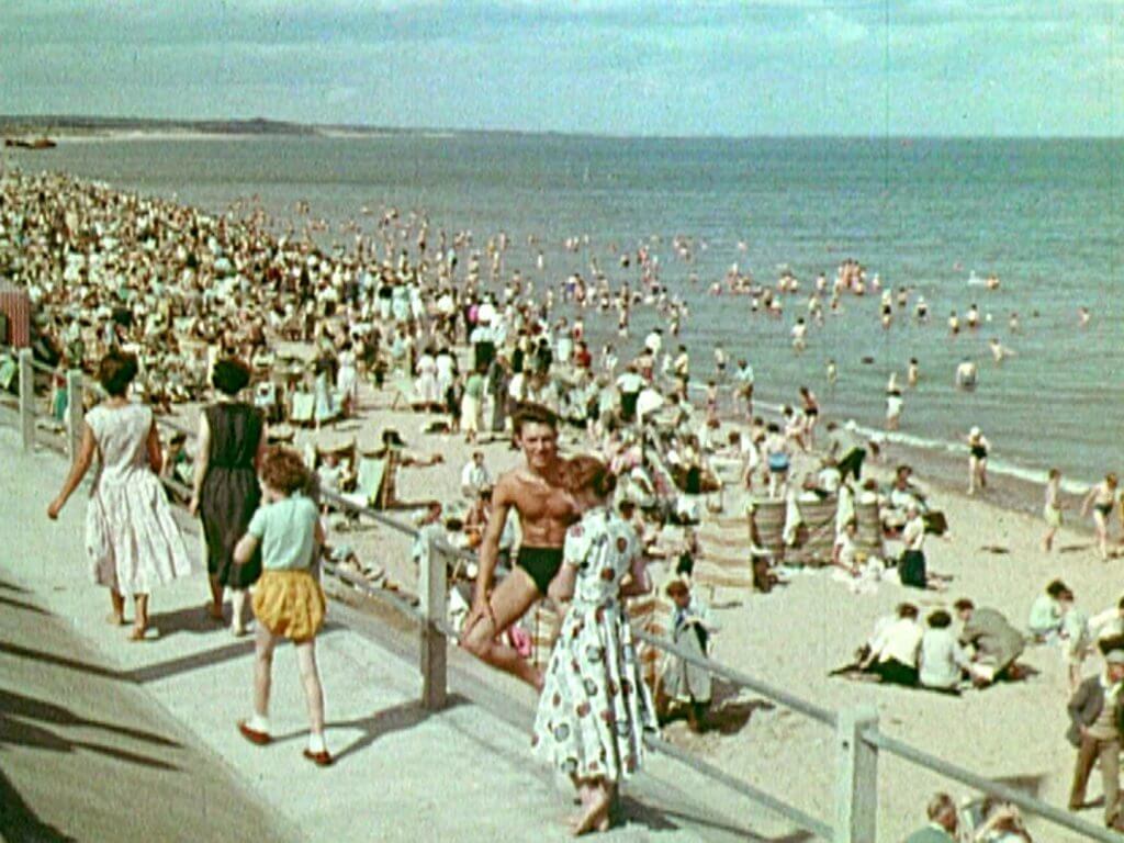 Still of couple on beach from film 'From Scotland with Love' by Virginia Heath