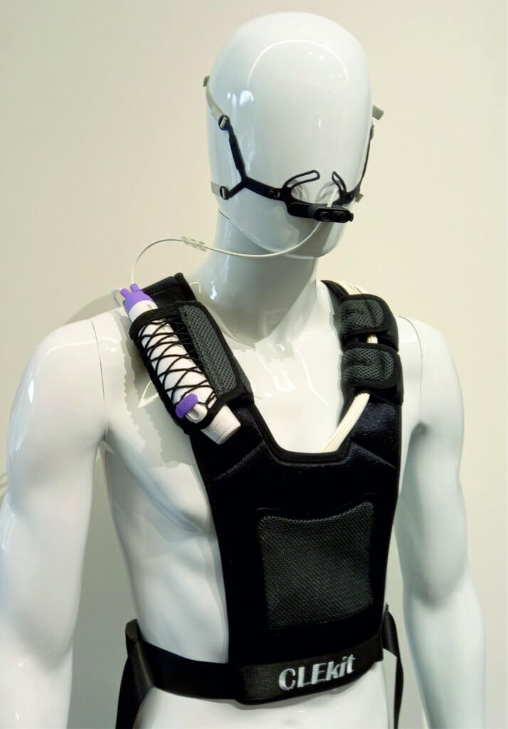 Mannequin shows the mask which holds the 'scope in place in the patient's mouth with the cabling fastened to the shoulder, which is secured by the garment 