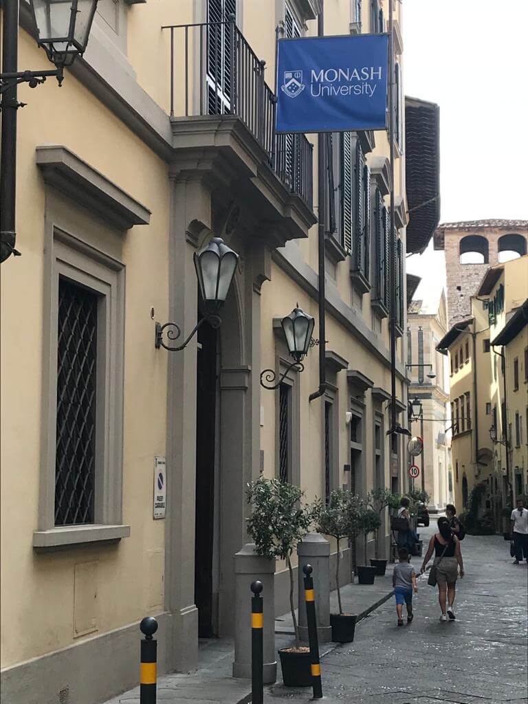 Photo shows the exterior of a period building on a cobbled street.